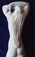 Sculpture of nude female carved in Cararra marble entitled 'passion'